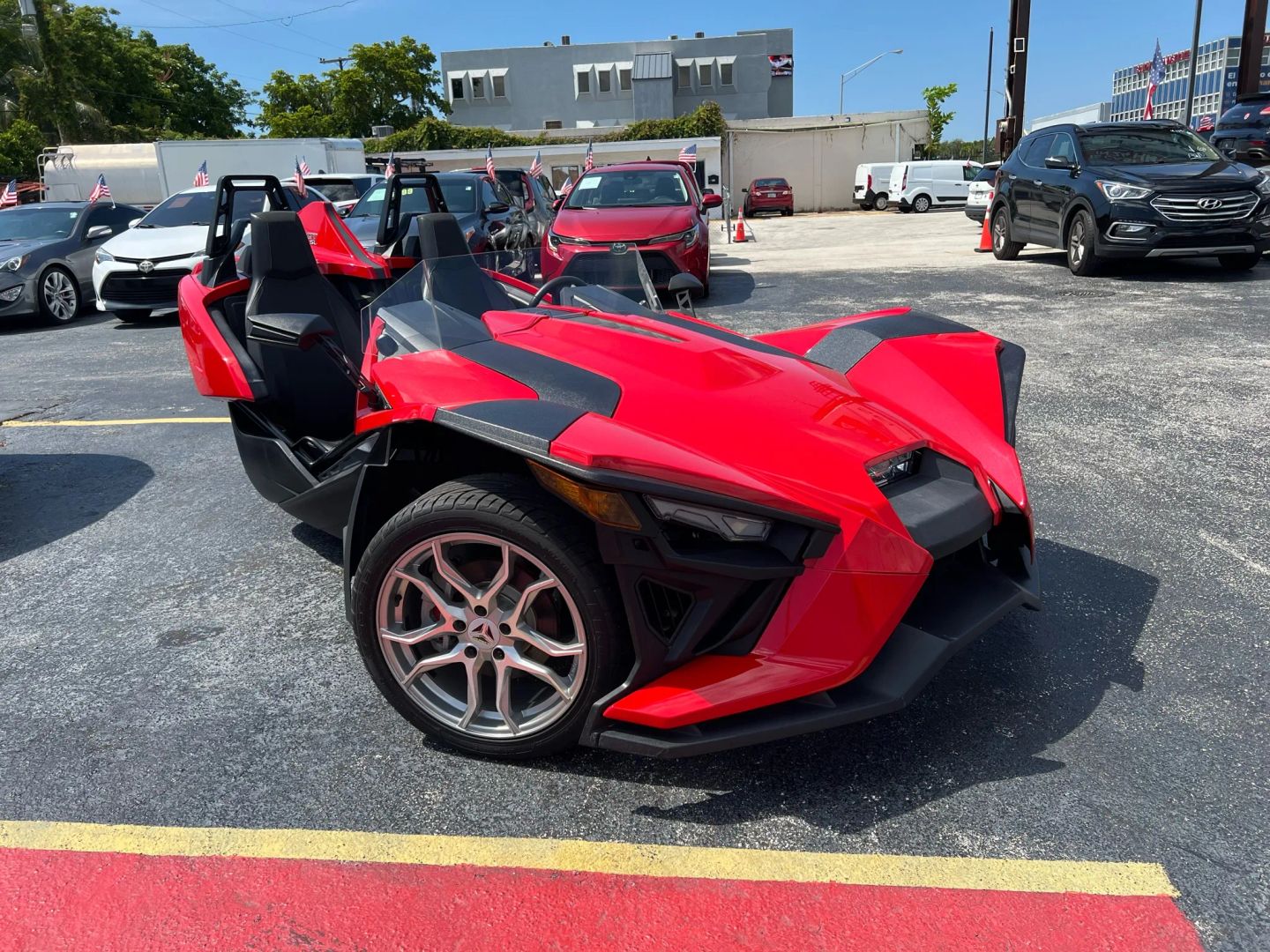 Close-up of a 2021 Polaris Slingshot SL on display at Machado Auto Sales.