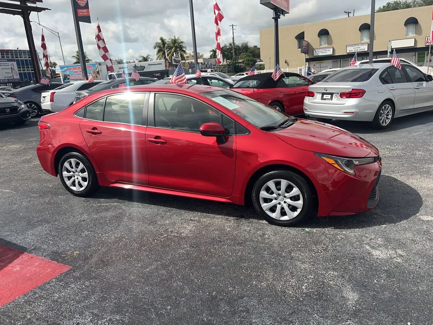 2021 Toyota Corolla side: One of the best used cars under 25000 in Miami for 2026. Available at Machado Auto Sales.