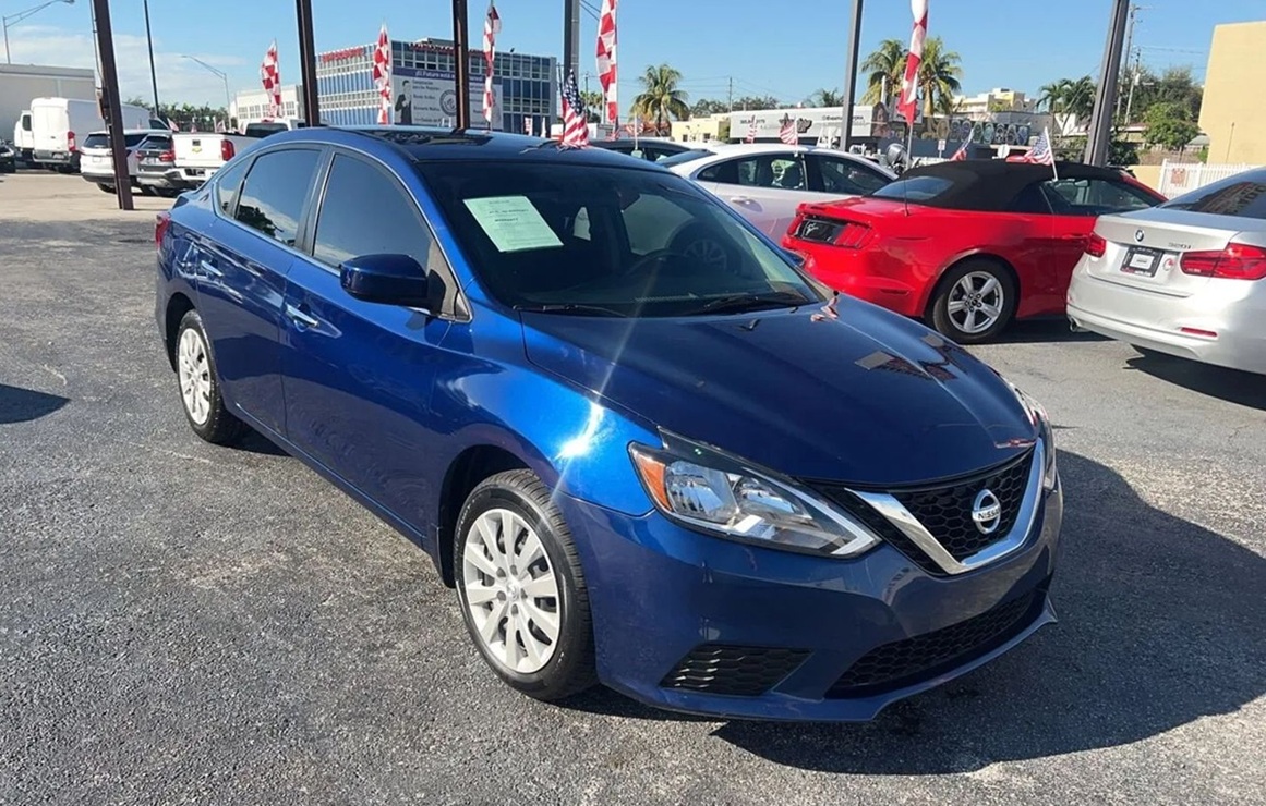 2017 Nissan Sentra: One of the options in the Nissan Sentra vs Altima comparison. Available right now at Machado Auto Sales, Miami.
