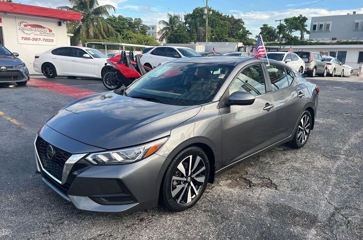 2021 Nissan Sentra: One of the options in the Nissan Sentra vs Altima comparison. Available right now at Machado Auto Sales, Miami.